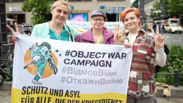 Activists protesting in Germany as part of the ObjectWar Campaign
