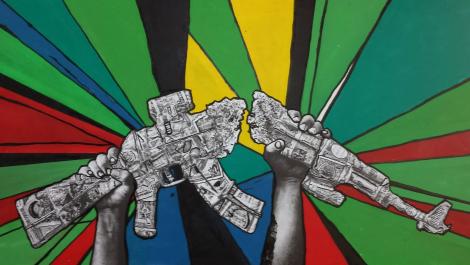 An drawing of a broken rifle with a colourful background