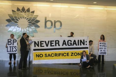Activists occupy the lobby of BP's Houston HQ