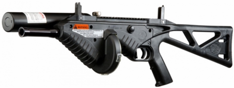 An FN303 less lethal weapon. It looks similar to a rifle but has an air tank and circular magazine