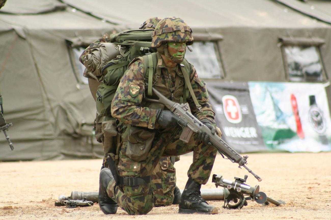 Swiss soldier holding weapon