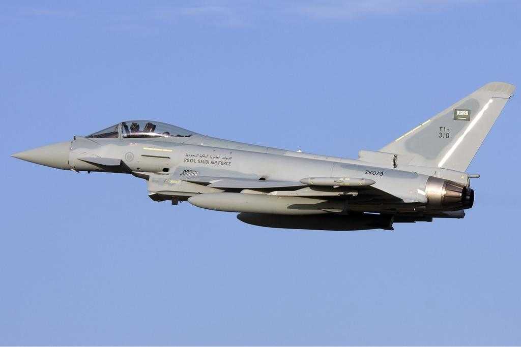 A eurofighter typhoon aircraft flying against a blue sky