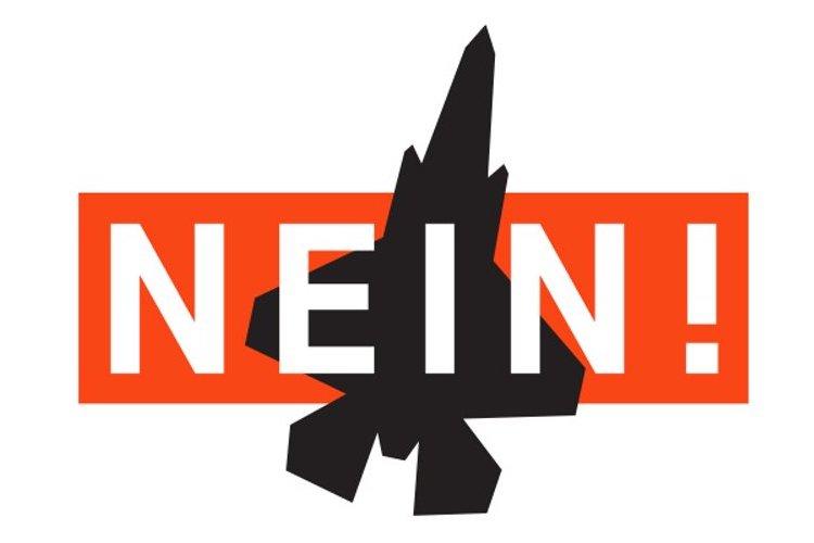 Un dibujo de un avión de combate negro con la palabra "Nein". ("¡No!") escrita en él