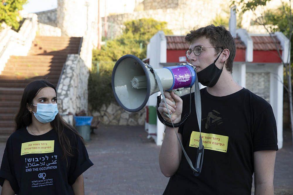 Conscientious objectors Shahar Peretz (left) and Daniel Peldi at an anti-annexation protest in the city of Rosh Ha'ayin June 2020. (Oren Ziv) 