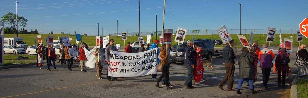 Around 20 activists picket the CANSEC arms fair in Canada