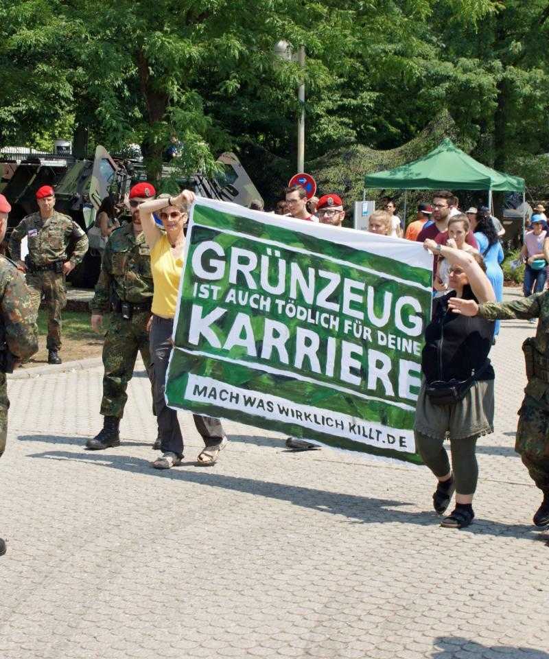 Activists protesting at a military site in Mannheim, Germany, on the Bundeswehr Day