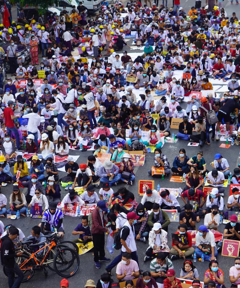 A mass protest in Myanmar. The photo shows hundreds of people in a street, from above