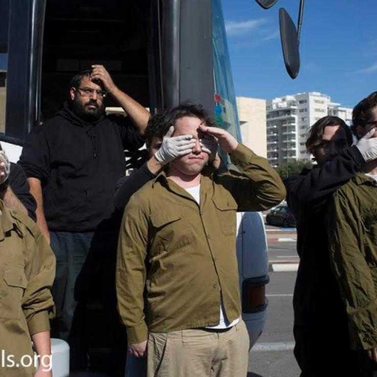 Hear no evil, see no evil, speak no evil: Activists in Israel dress as soldiers to take part in a protest, in solidarity with imprisoned conscientious objectors