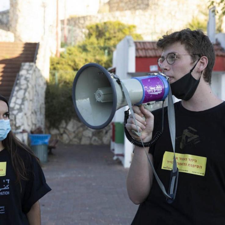 Conscientious objectors Shahar Peretz (left) and Daniel Peldi at an anti-annexation protest in the city of Rosh Ha'ayin June 2020. (Oren Ziv) 